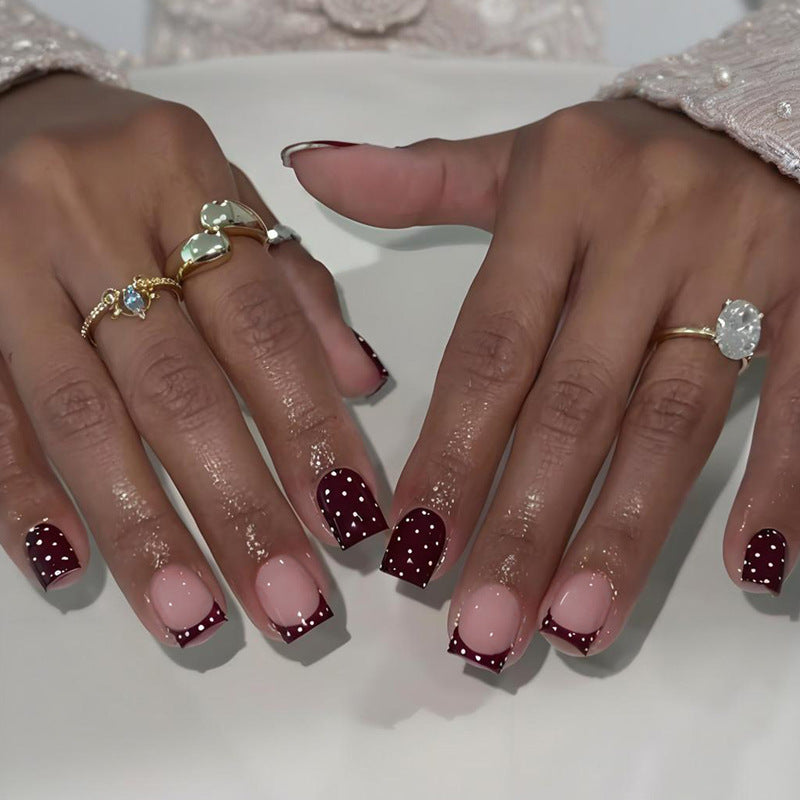 Art nail set with elegant French tips and playful accents Stornfield