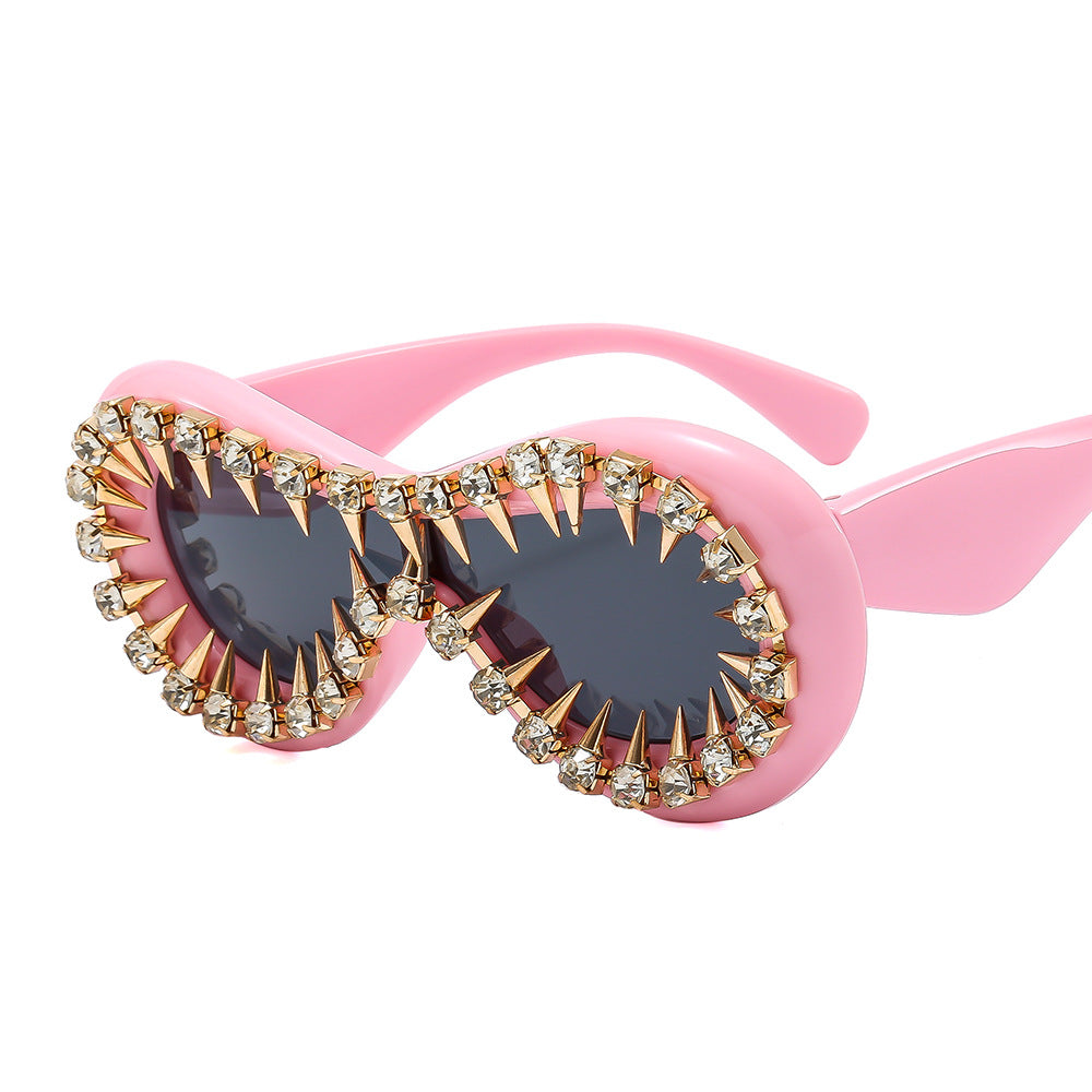 Women's fashionable sunglasses with extravagant spikes and crystal embellishments Stornfield