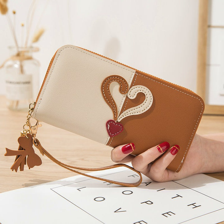 Stylish wallet with heart appliqués Stornfield