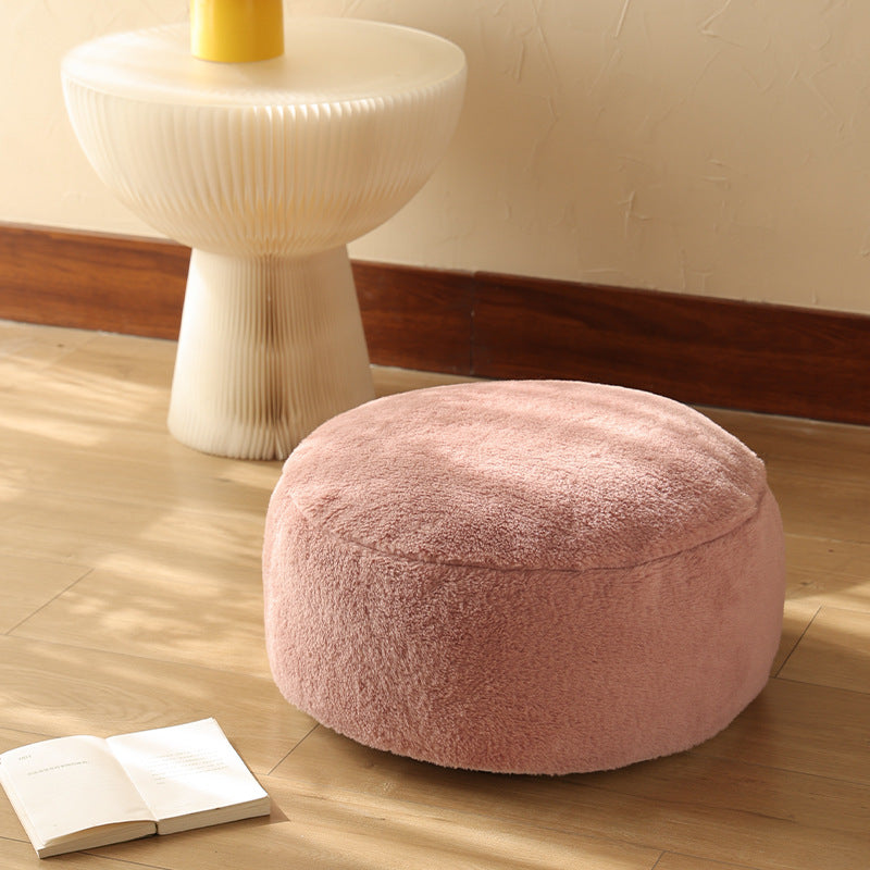 Low cow leather pouf with plush microfibre cover and shape-retaining foam filling