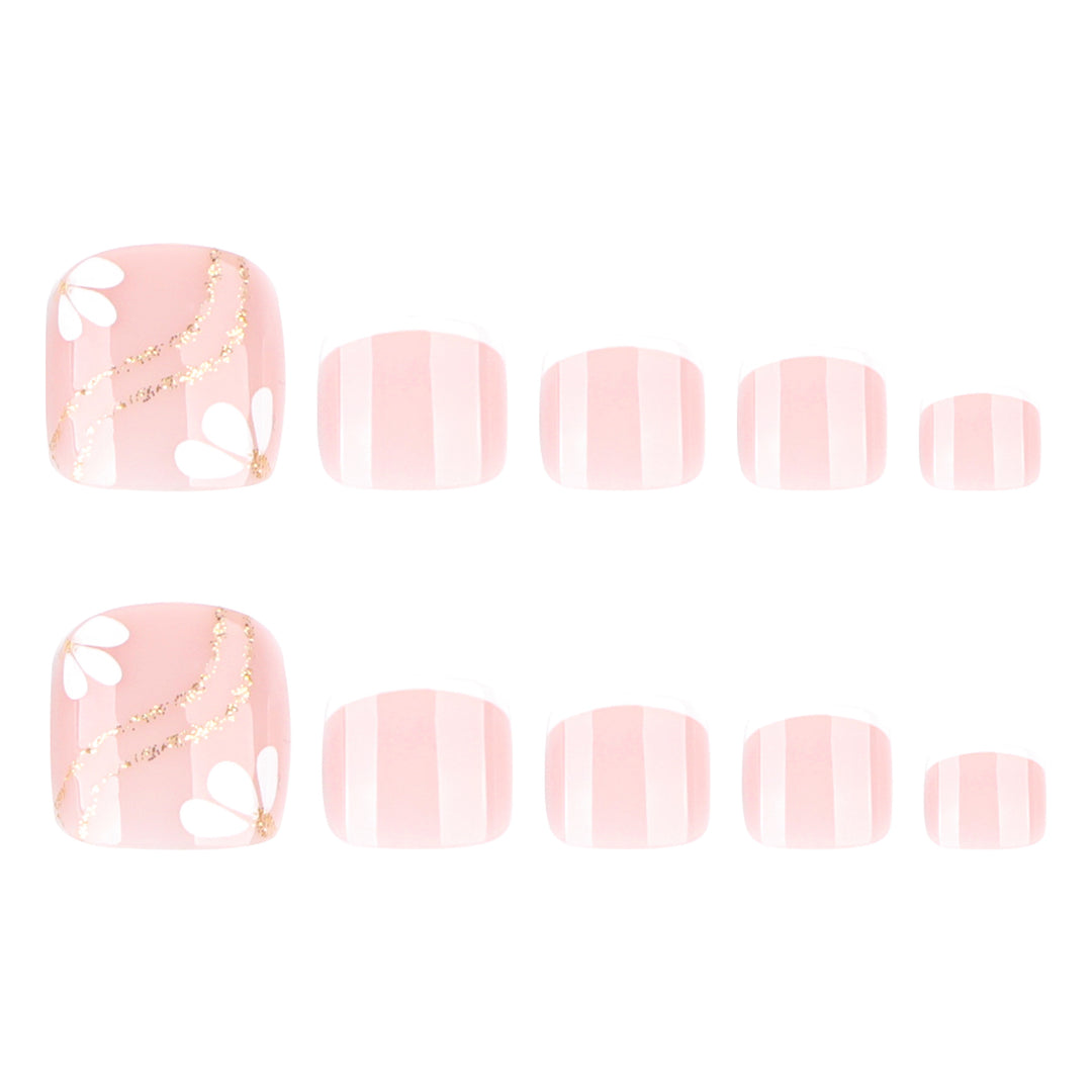 Nail art with elegant blooming designs and glitter accents Stornfield