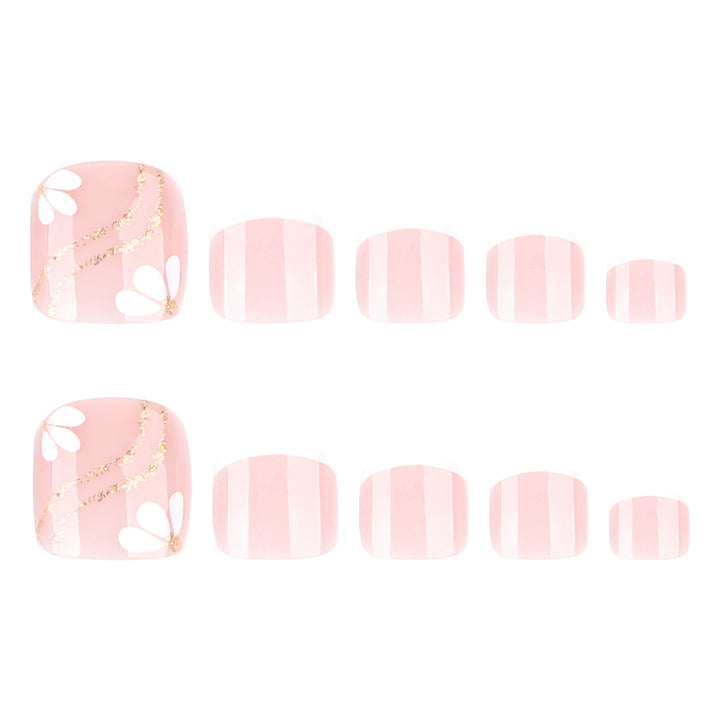 Nail art with elegant blooming designs and glitter accents Stornfield