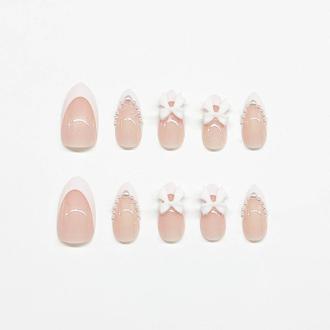 Elegant 3D Bow-Embellished Nail Art Extensions Stornfield