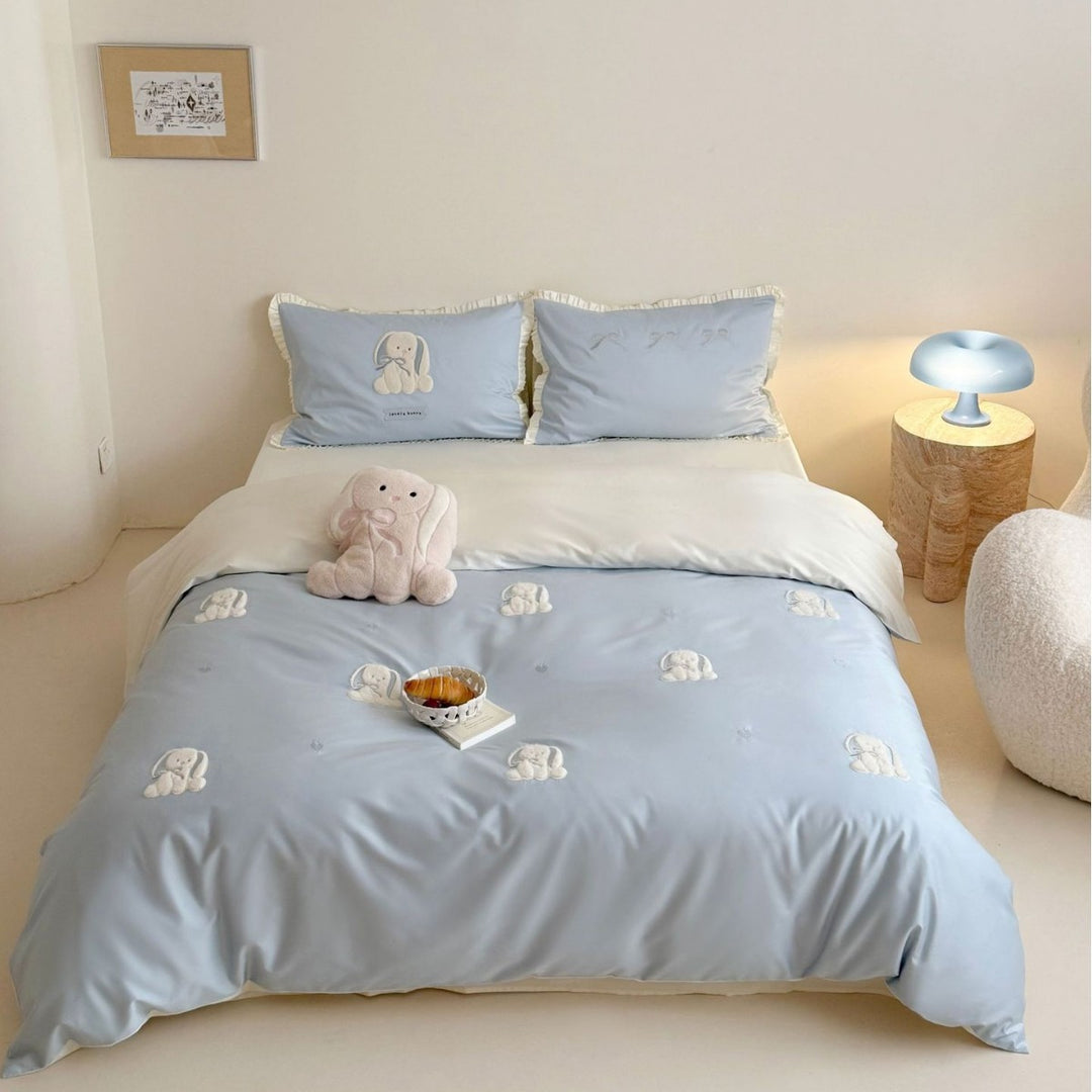 Embroidered Satin Duvet Cover Set with Ruffled Pillowcases & Plush Accent
