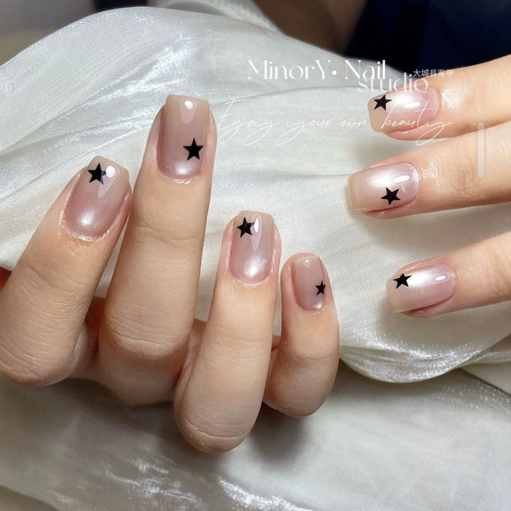 Artistic Press-On Nail Set with Star Designs Stornfield