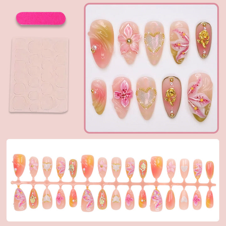 Artificial nail set with delicate flower designs and glamorous accents Stornfield