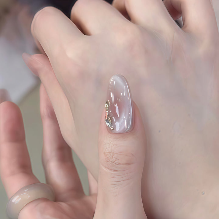 Glamorous artificial nails with rhinestone embellishments Stornfield