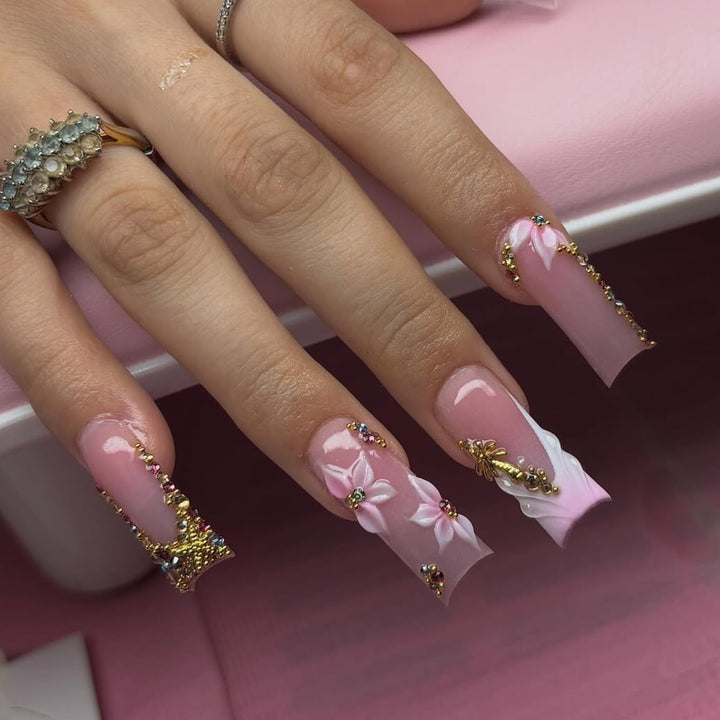Artistic Nail Extensions with Rhinestone and Flower Embellishments Stornfield