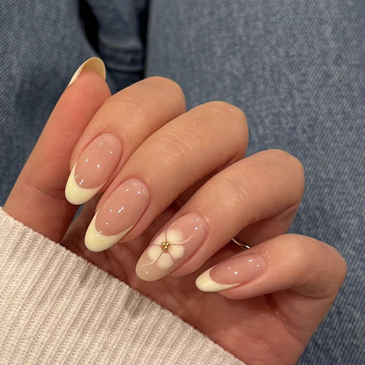 Acrylic nail set with elegant blue and nude color accents Stornfield