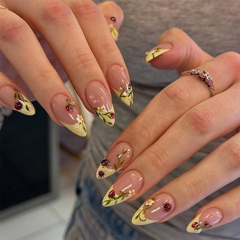 Nail set with floral motifs and glossy accents Stornfield