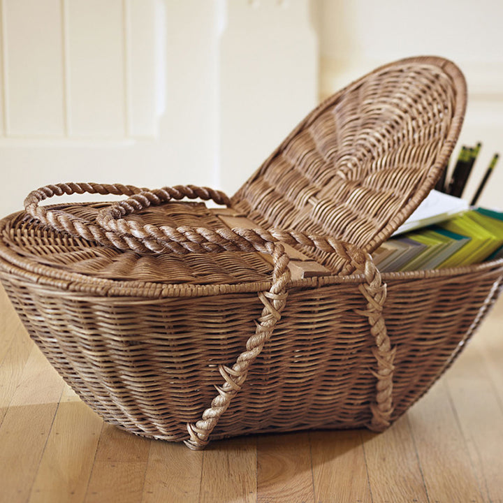 Practical storage basket with lid made of woven natural material Stornfield