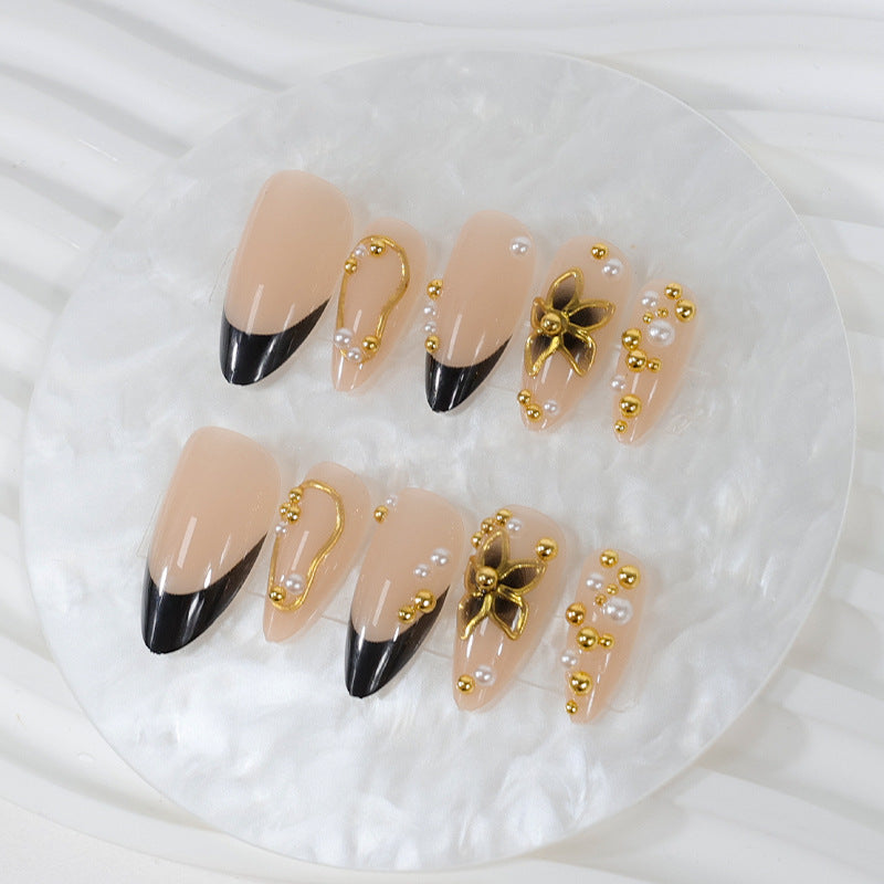 Acrylic nail set with handmade embellishments Stornfield