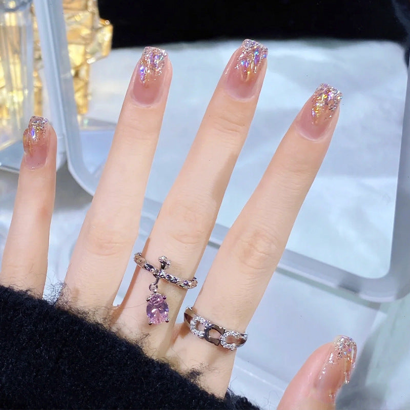 Acrylic nail set with sparkling holographic accents Stornfield