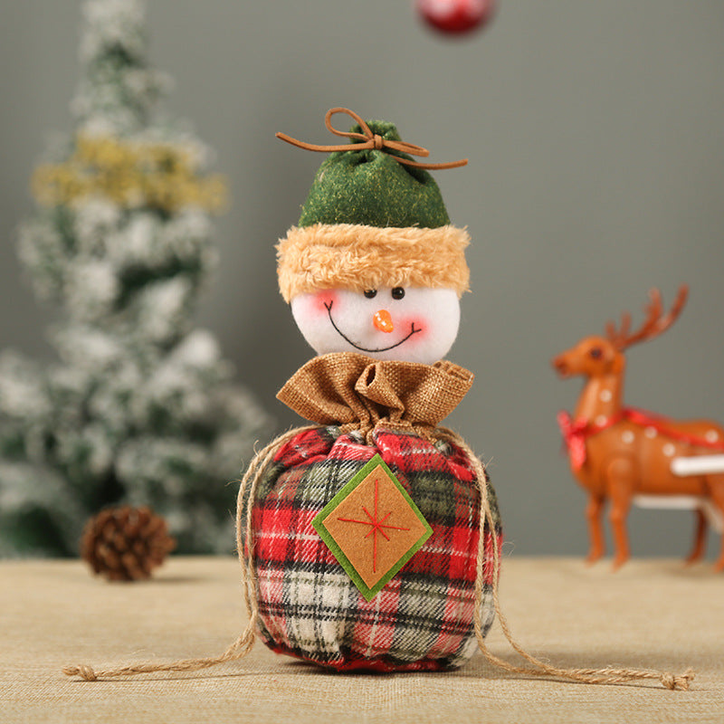 Cute Christmas gnome with gift sack Stornfield