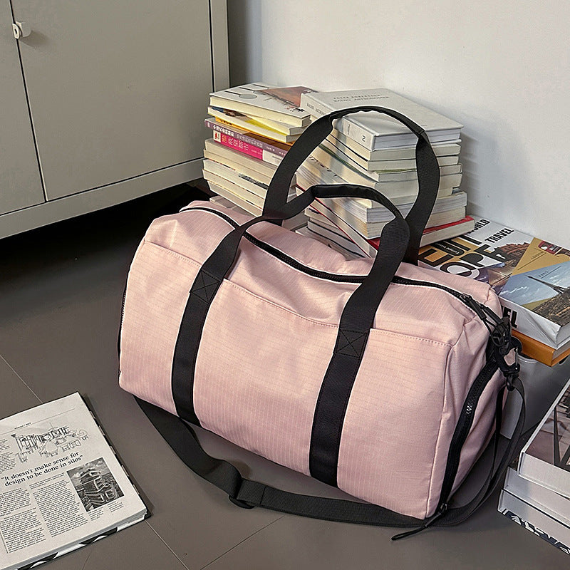 Sporty travel bag with reinforced carrying system and secure interior Stornfield