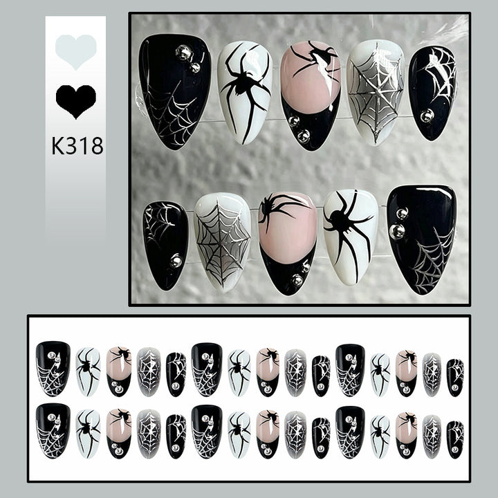 Creative nail art set with Halloween spider design Stornfield