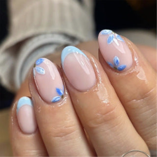 Artistic acrylic nails with elegant flower design Stornfield
