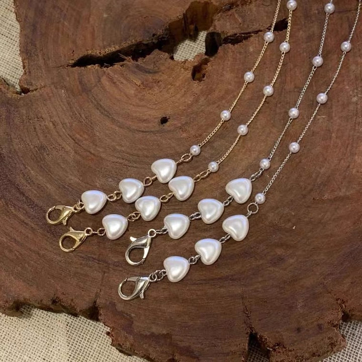 Stylish jewelry band with heart-shaped beads Stornfield