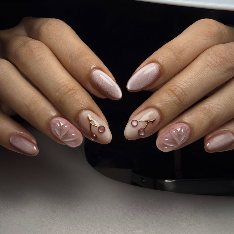 Acrylic nail set with elegant high-gloss finish and creative embellishments Stornfield
