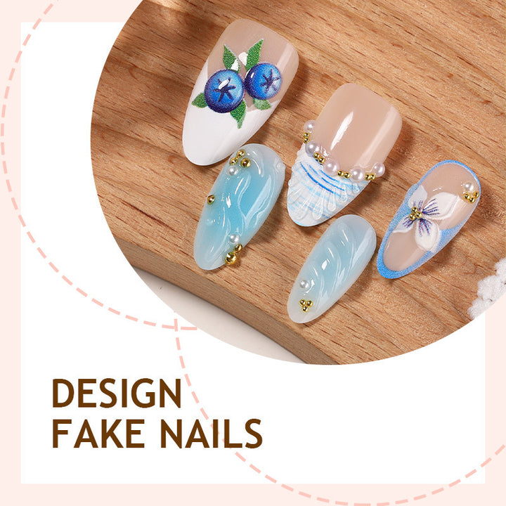 Artificial nail set with floral accents and sparkling details Stornfield