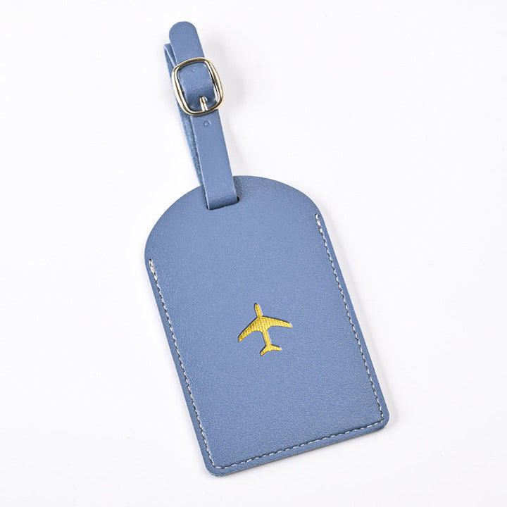 premium leather luggage tag with adjustable buckle strap and embossed airplane Stornfield