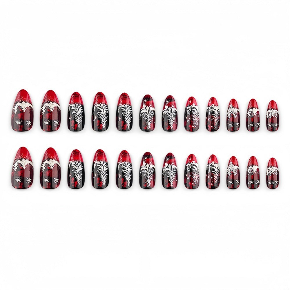 Artificial nails in festive Christmas design with elegant glitter Stornfield