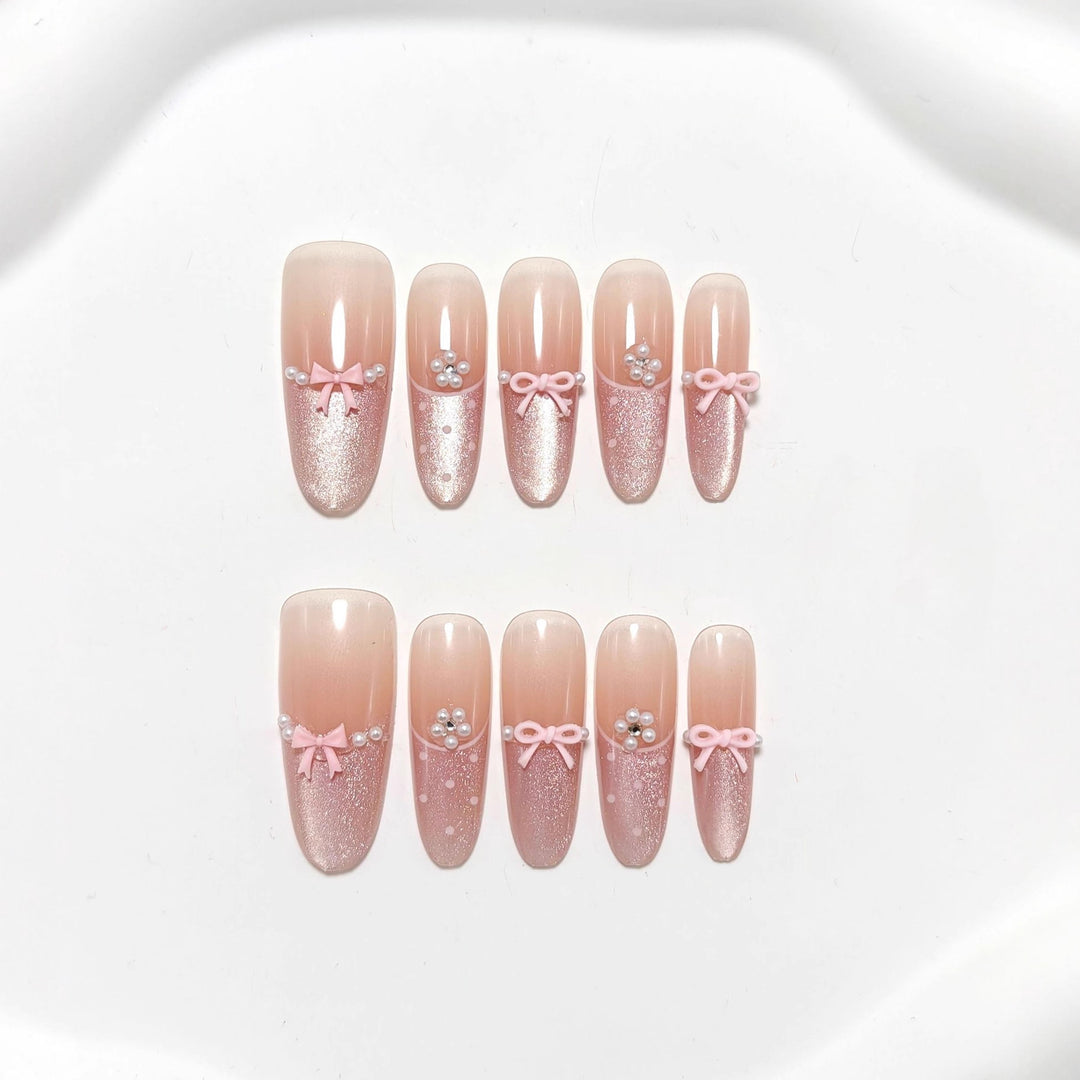 Elegant Artificial Nails with Delicate Gradients and Ribbons Stornfield