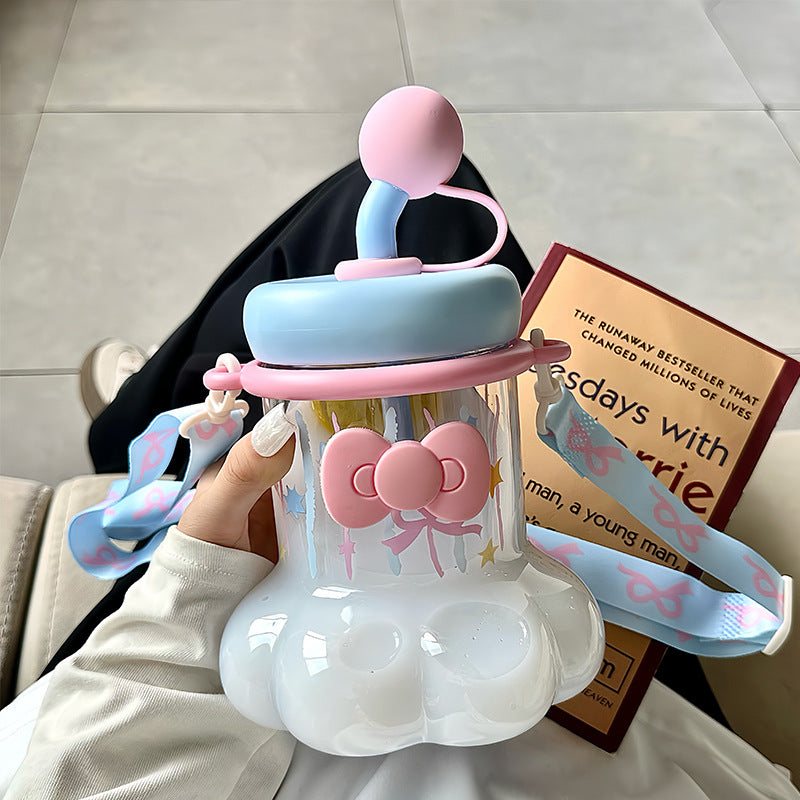 Women's water bottle with integrated silicone carrying handle and playful design Stornfield