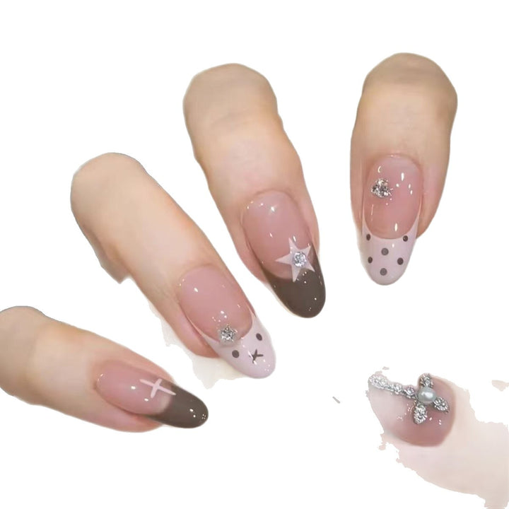 Artistic Press-On Nail Design with Decorative Accents Stornfield