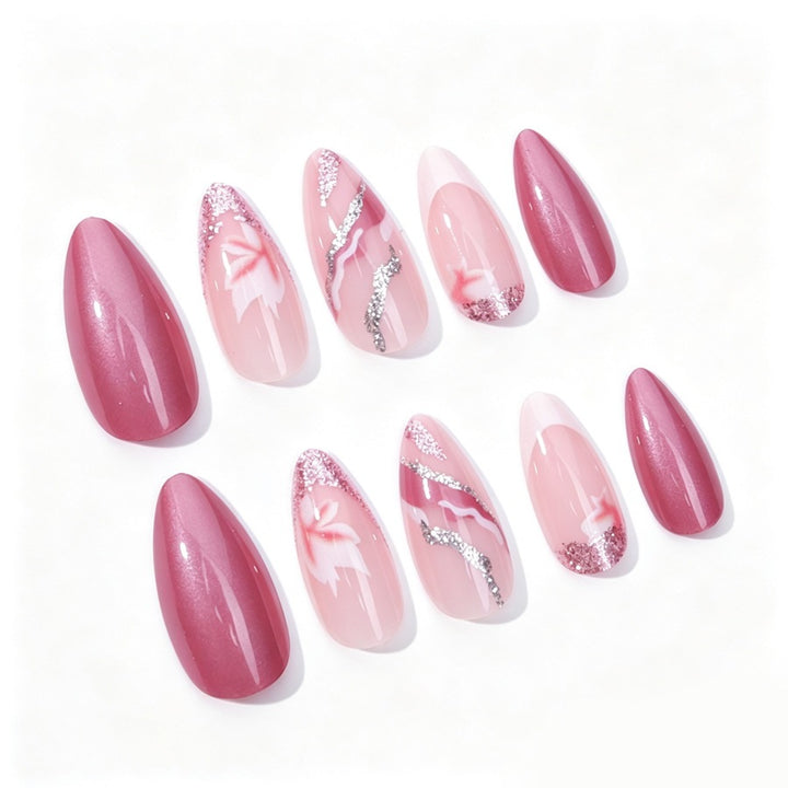 Acrylic nail set with floral patterns and glitter elements Stornfield