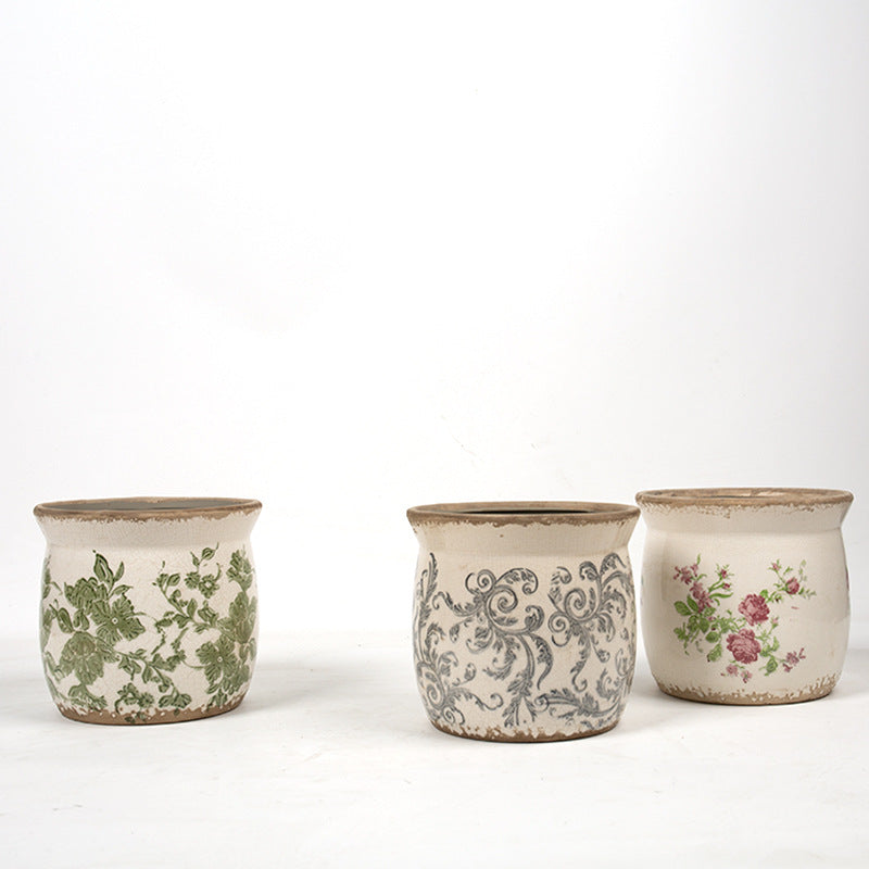 Decorative ceramic plant container with artistic design Stornfield