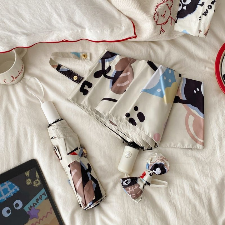 Ladies practical folding umbrella with playful design Stornfield