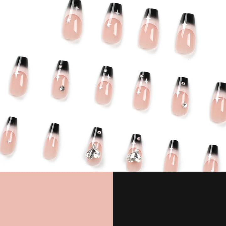 Artificial nail extensions with elegant ombre design and glitter accents Stornfield