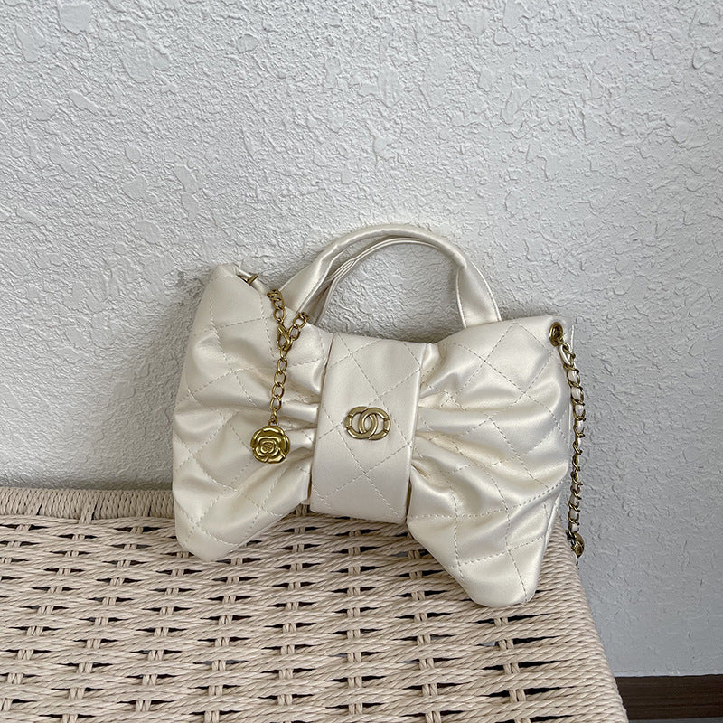 Quilted Bow Accent Handbag