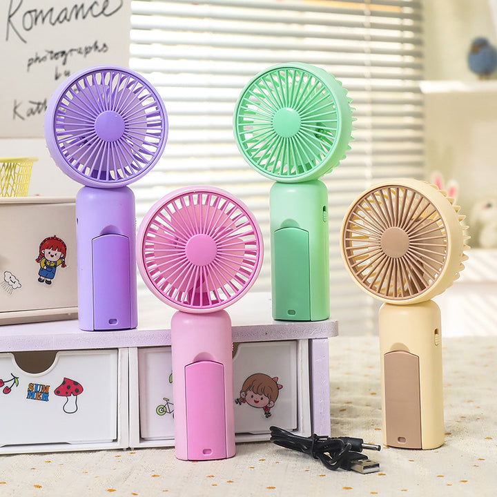 Women portable mini hand fan with USB charging function and ergonomic design Stornfield