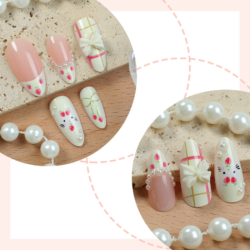 Decorative Press-On Nail Set with Floral and Whimsical Designs Stornfield