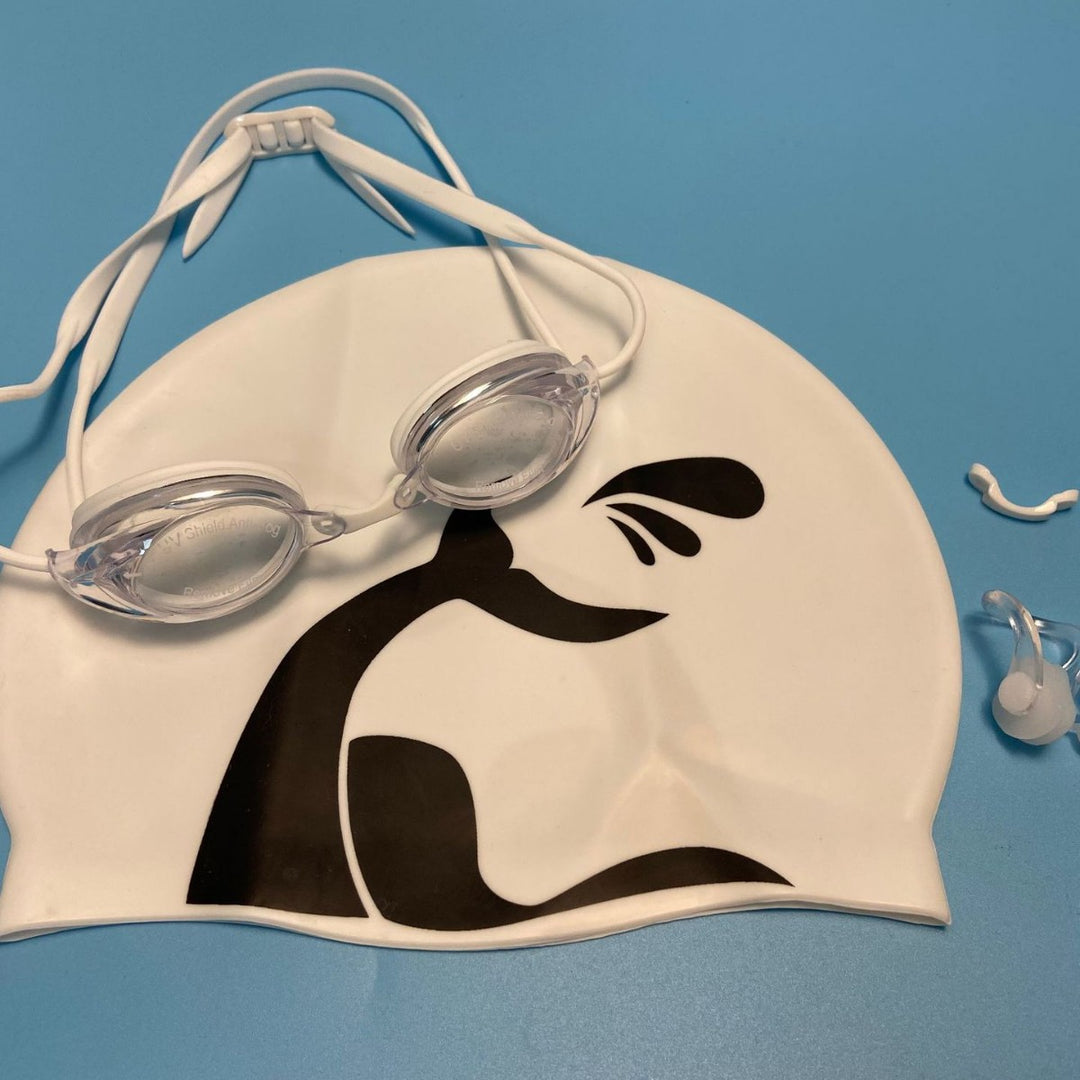 Swimming goggles with adjustable head strap and comfort nose piece Stornfield