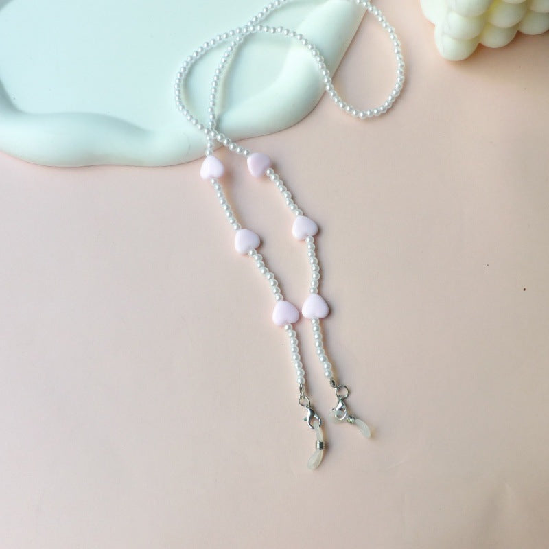 Fashionable pearl necklace with heart pendants Stornfield