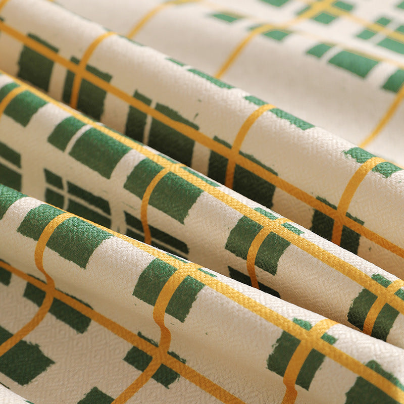 Rectangular coated tablecloth with checked plaid pattern and water-repellent surface Stornfield