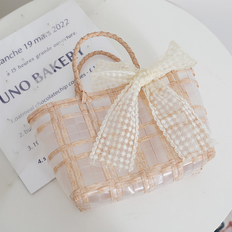 Handcrafted basket bag with elegant bow applique Stornfield