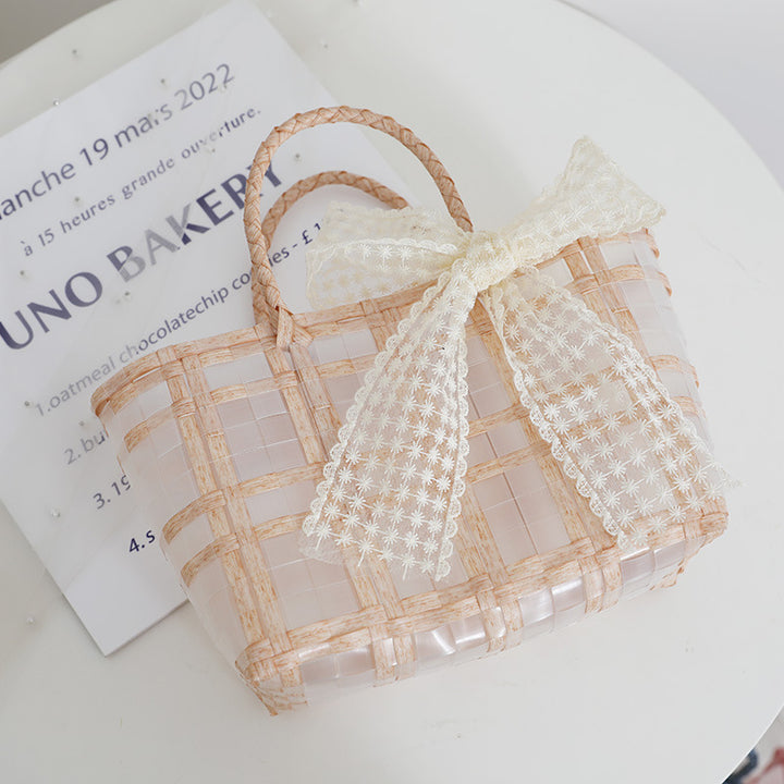 Handcrafted basket bag with elegant bow applique Stornfield