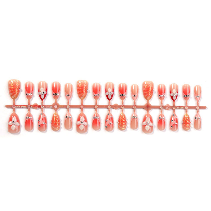 Creative nail art set with elegant flower designs and glitter accents Stornfield