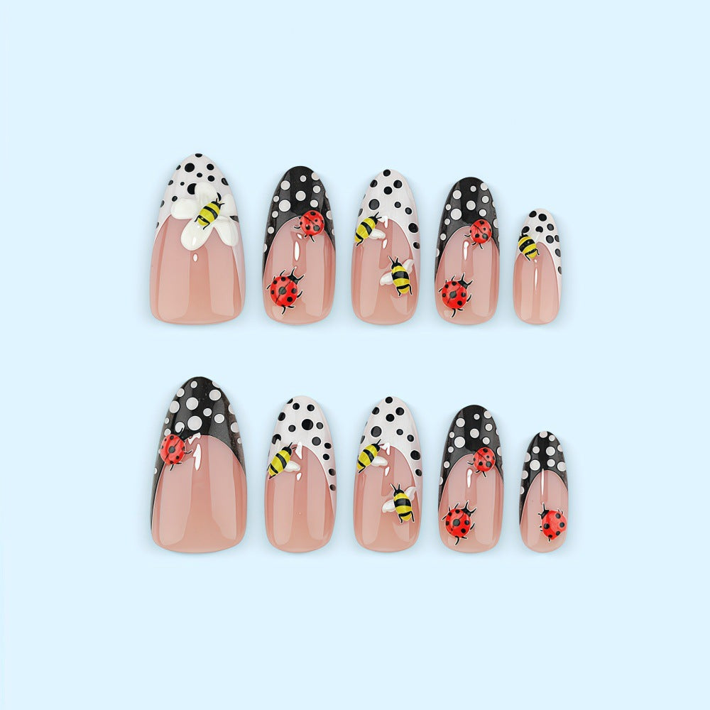Artificial nails with playful insect design Stornfield