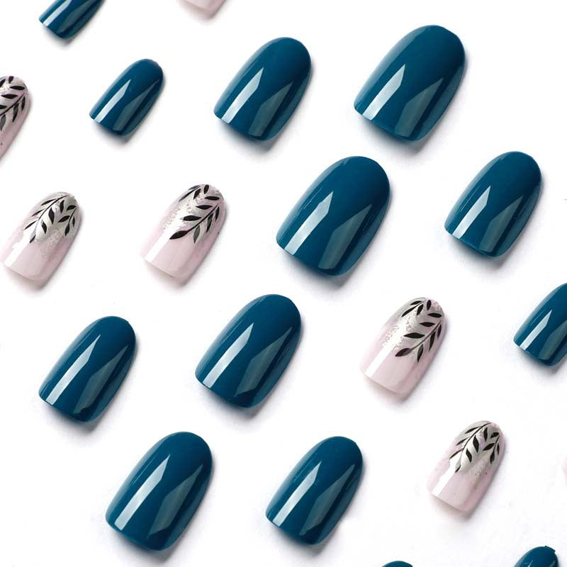 Elegant Nail Art with Floral Accent and Metallic Details Stornfield