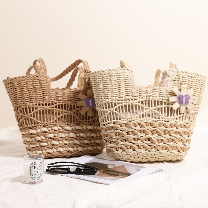 Braided basket bag with decorative flower appliqué Stornfield