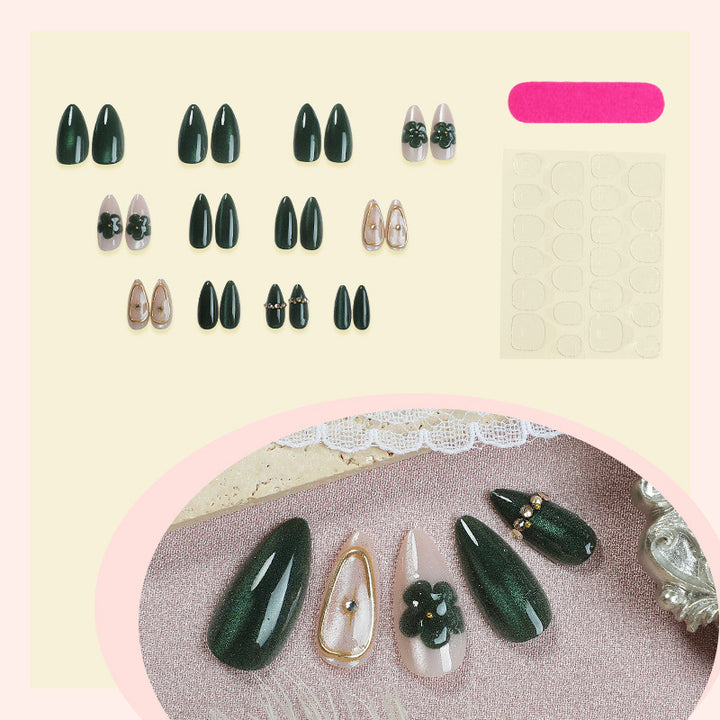 Artificial nail set with floral accents and glitter details Stornfield