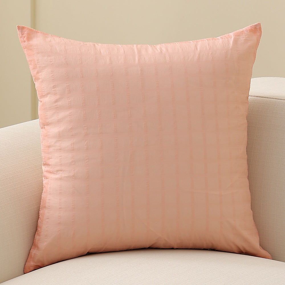 Square decorative cushion with delicate mother-of-pearl look and fine micro tuft structure