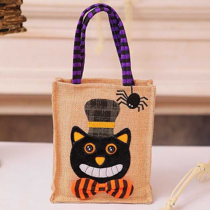 Halloween-Jute bag with stitched black cat and striped carrying handles