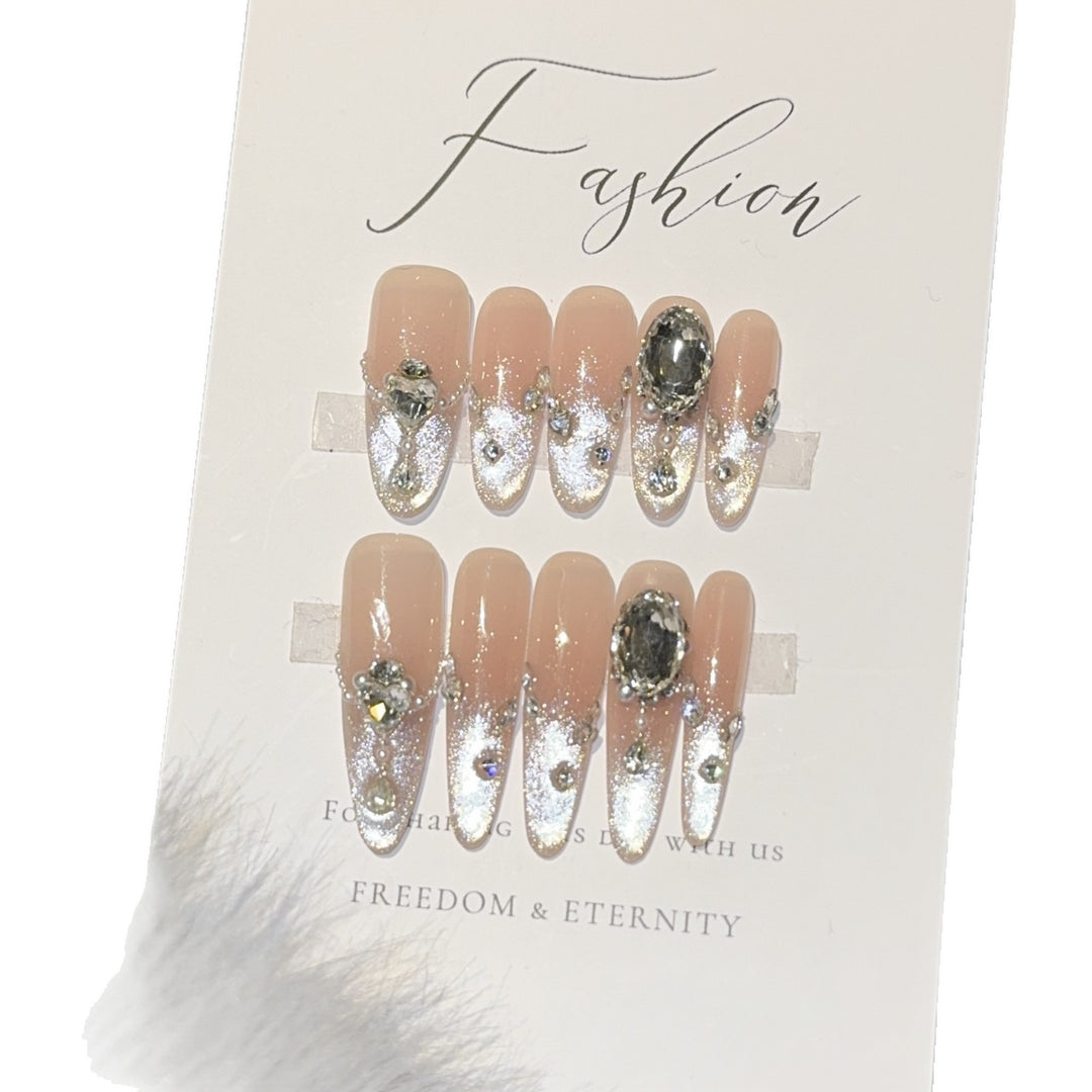 Glamorous artificial nail tips with rhinestone accents Stornfield