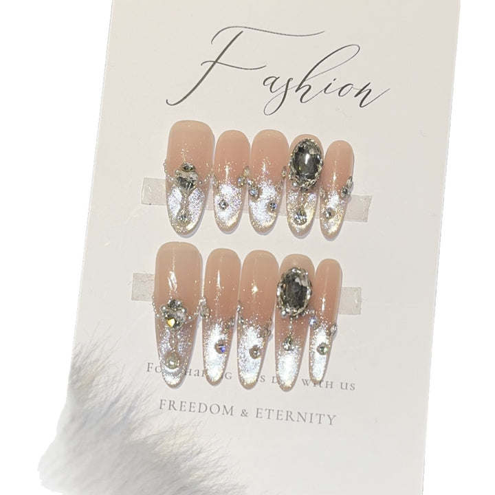Glamorous artificial nail tips with rhinestone accents Stornfield